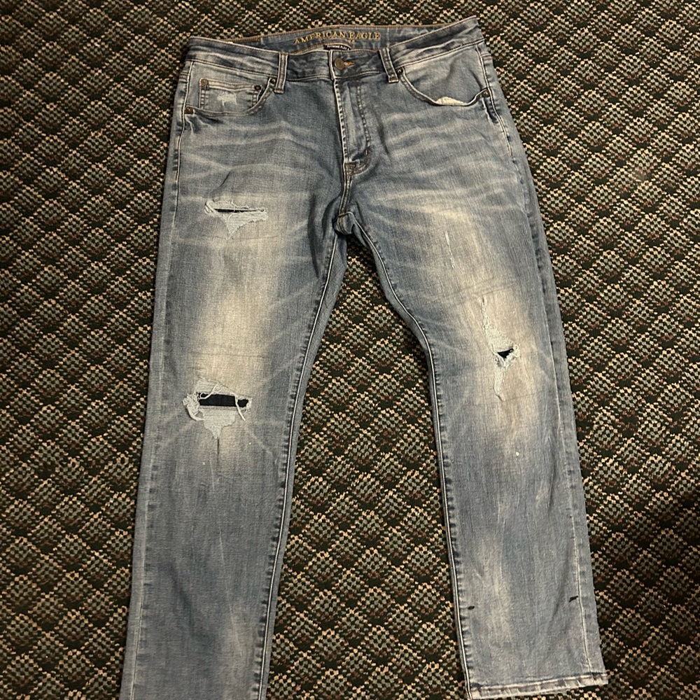 American Eagle Outfitters Light Blue flex slim straight Distressed Jeans